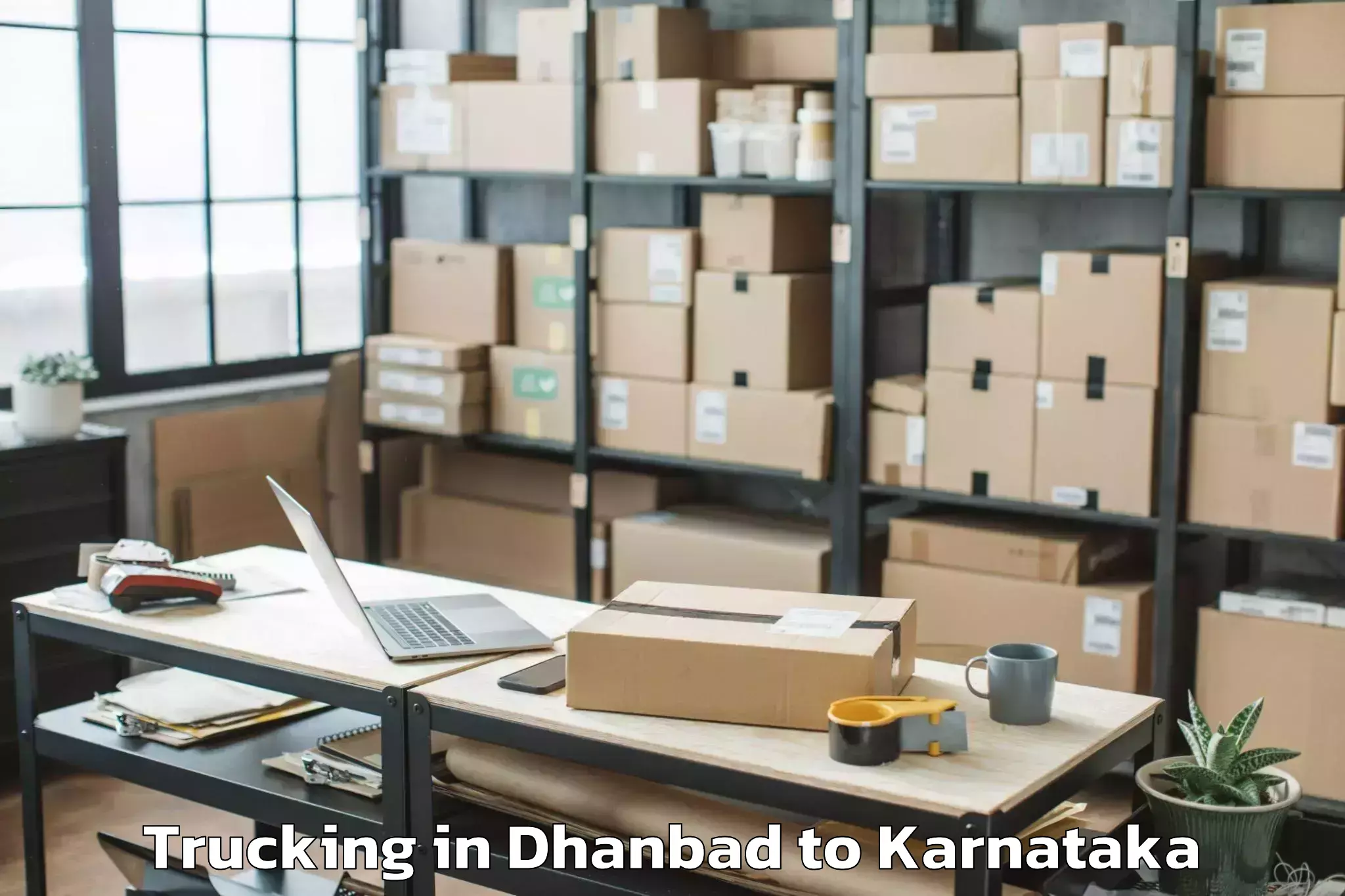 Book Dhanbad to Kunigal Trucking Online